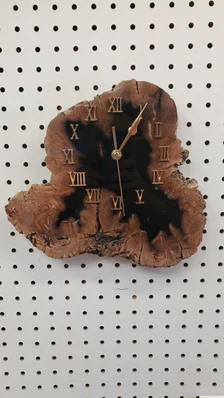 Petrified wood slab clock with gold Roman numerals, handcrafted by Petrified Time